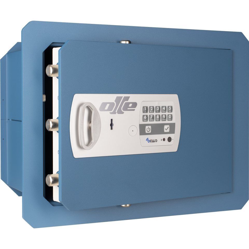 Caja fuerte de pared azul con puerta abierta, teclado electrónico y tirador plateado.
