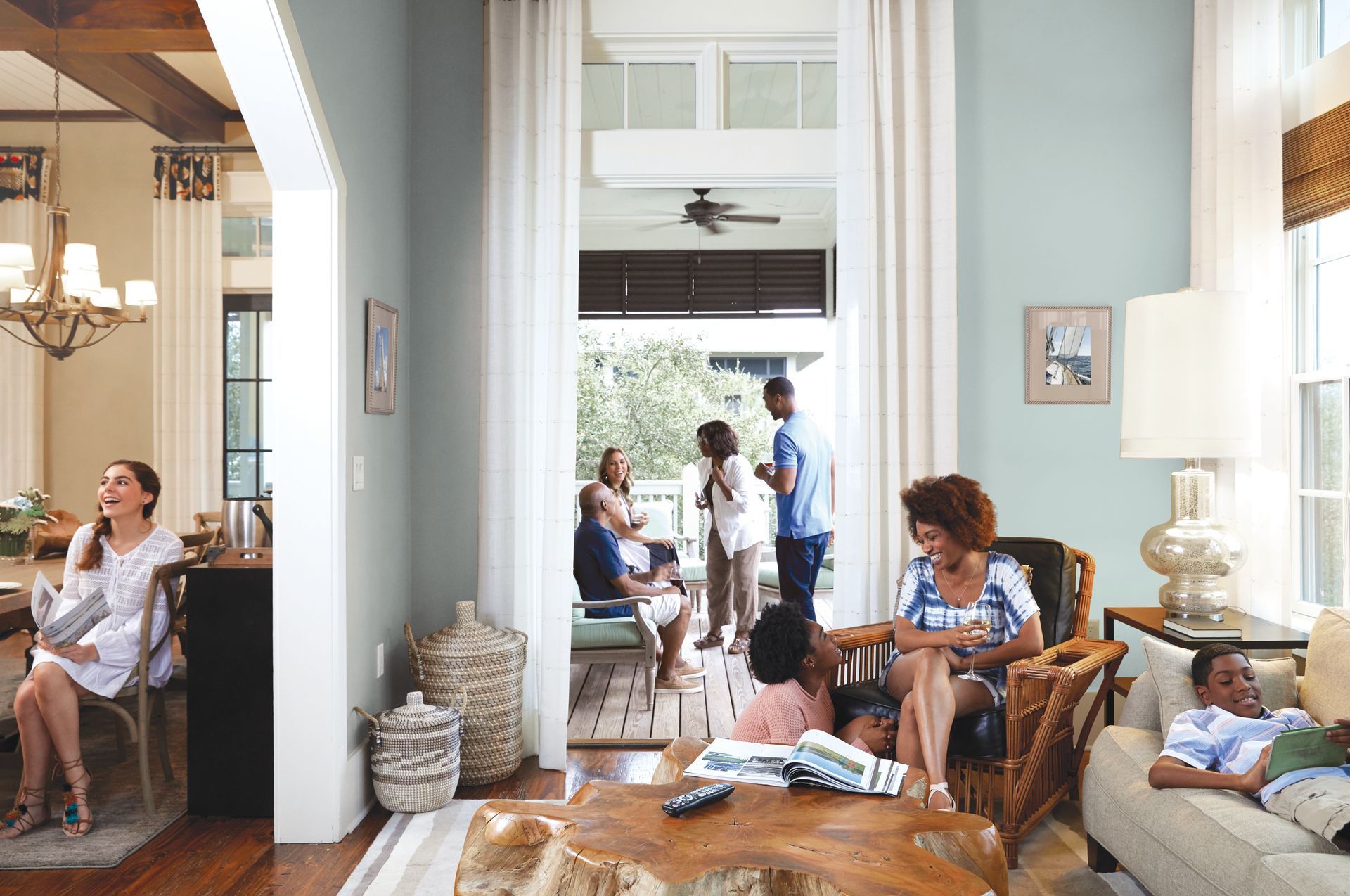 A group of people are sitting in a living room.