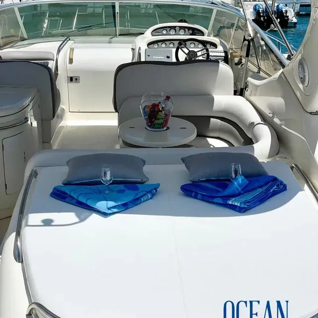 A white boat with the word ocean on the side