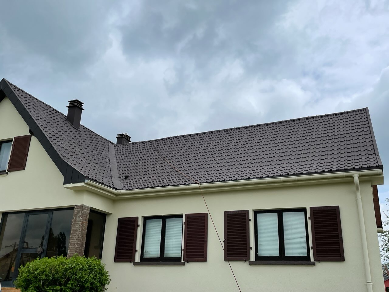 Toiture à peindre pour apporter un nouvel éclat