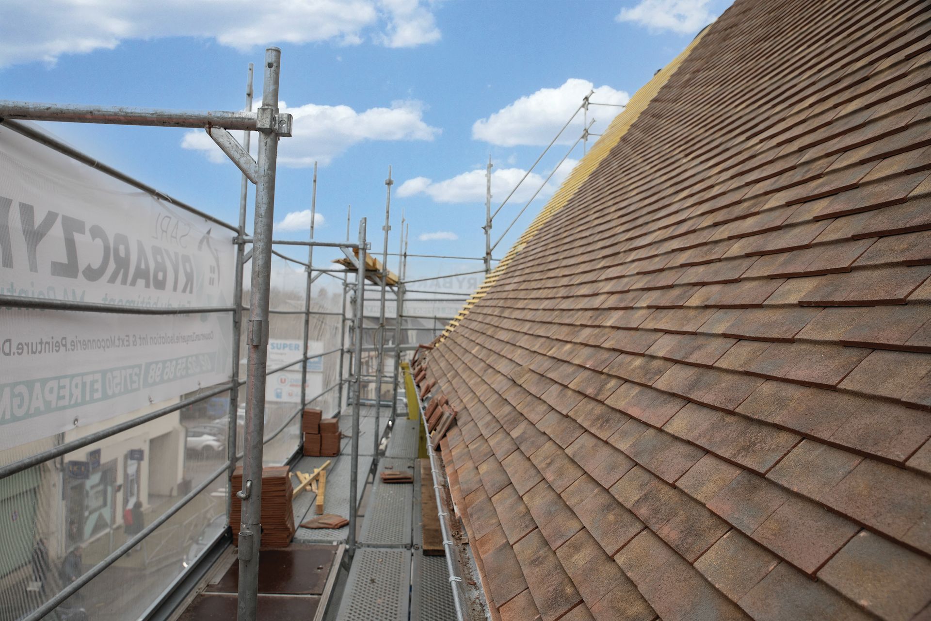 Remplacement de la couverture de toit d'une maison