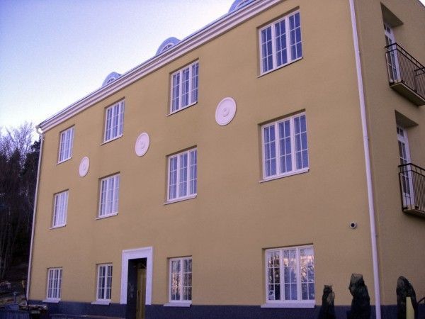 Kivitalon julkisivurappaus