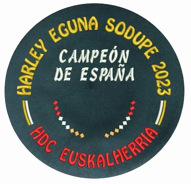 Un círculo negro con Harley Eguna Sodupe escrito en él.