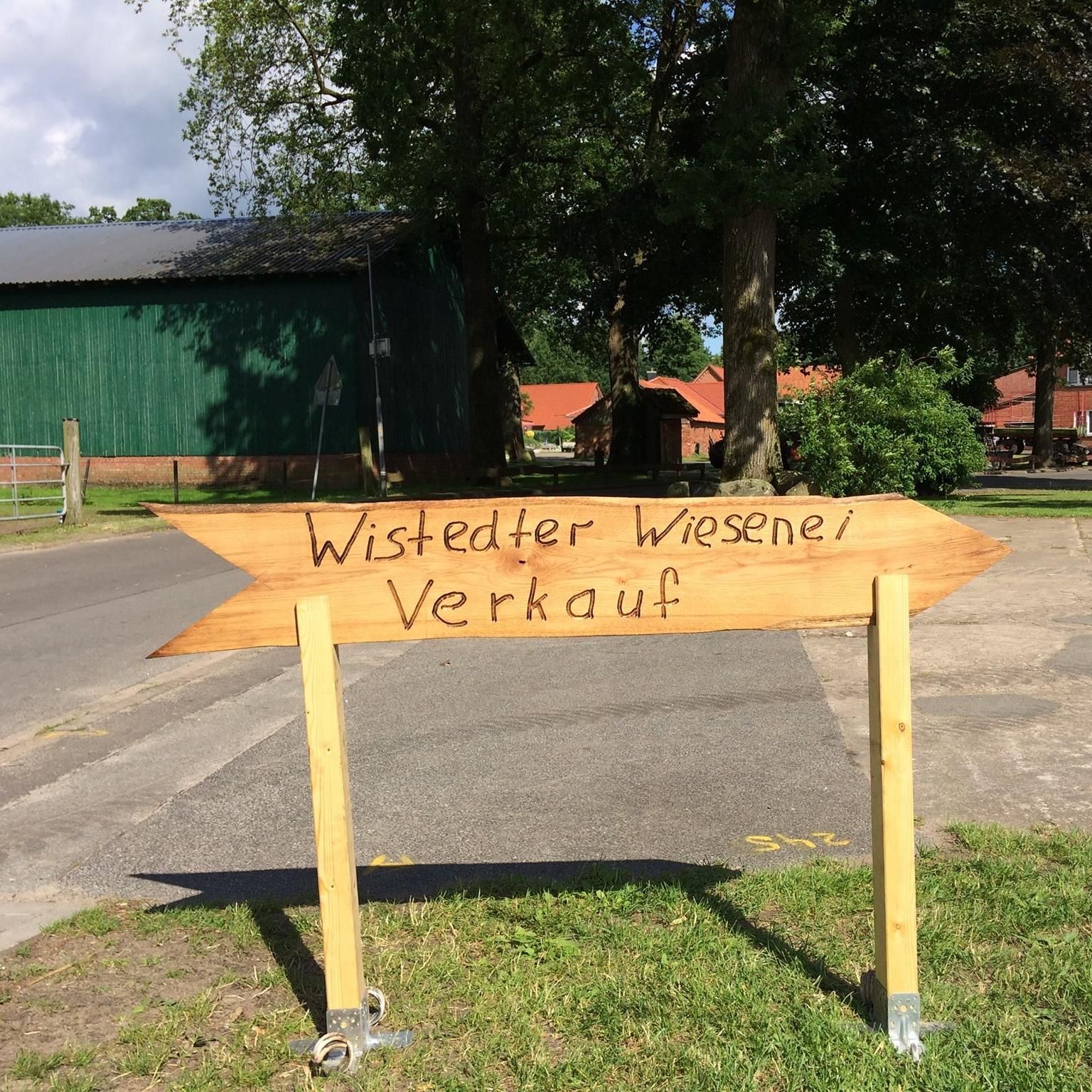 Ein Holzschild mit der Aufschrift