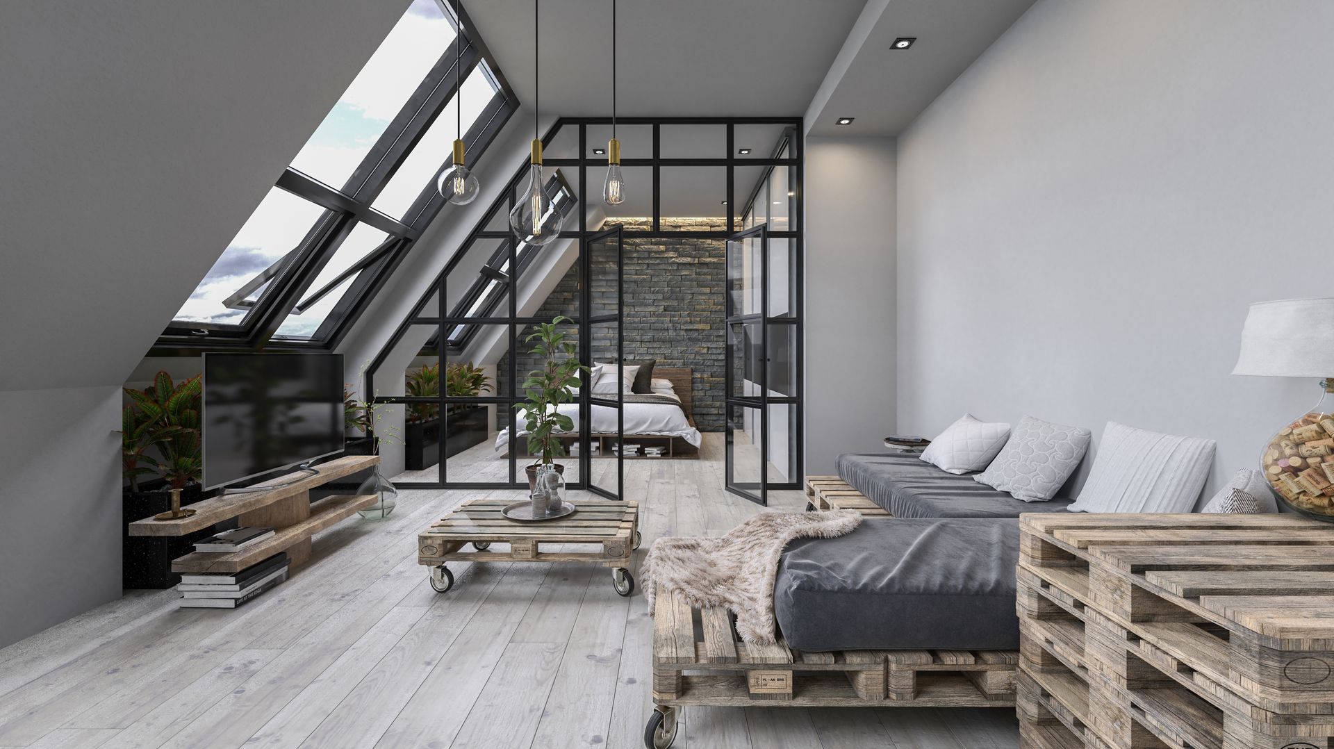 Salon et chambre aménagés dans les combles
