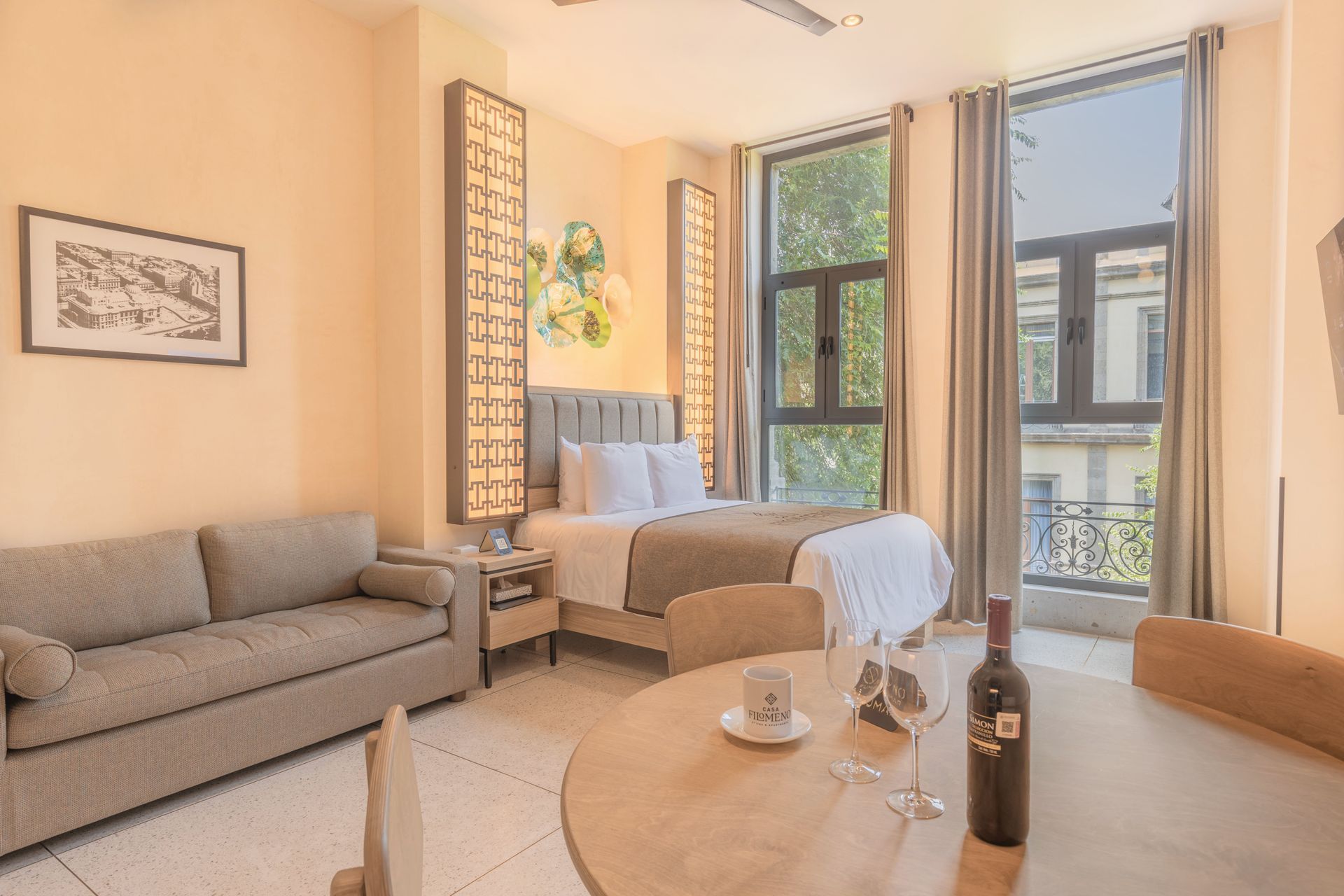 There is a bottle of wine on the table in the room.