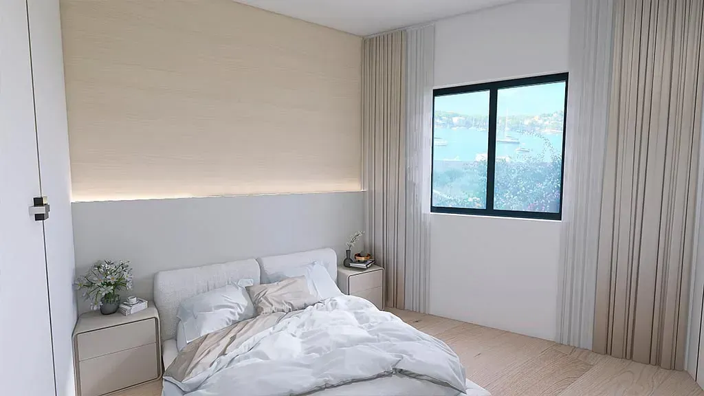 Un dormitorio con una cama, mesita de noche y ventana.