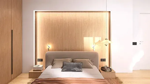 Un dormitorio con una cama y una pared de madera detrás.