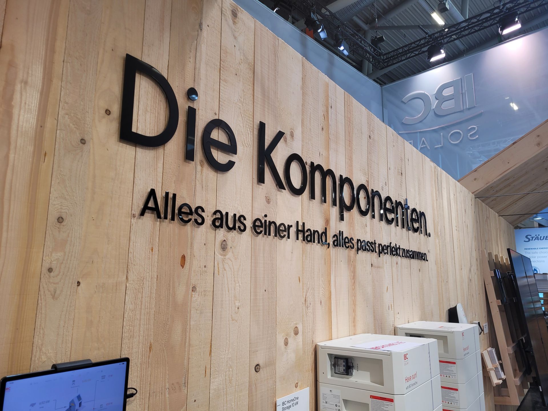 Sign on wooden wall: 