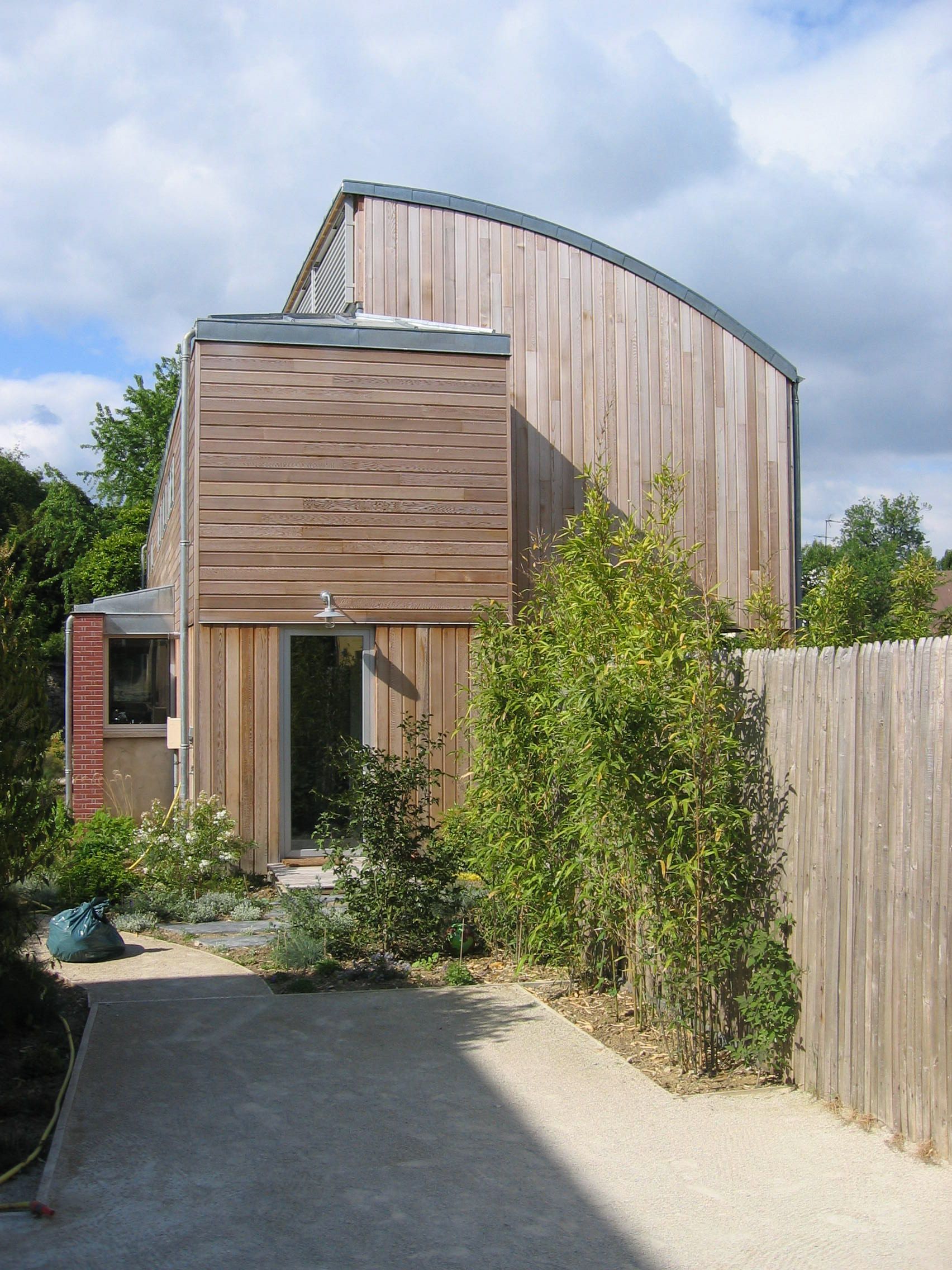 Maison en bois sur terrain