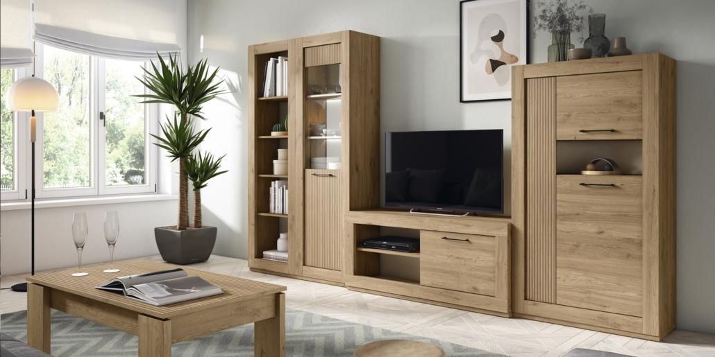 Dormitorio con muebles blancos, paredes grises y luz natural procedente de una ventana.