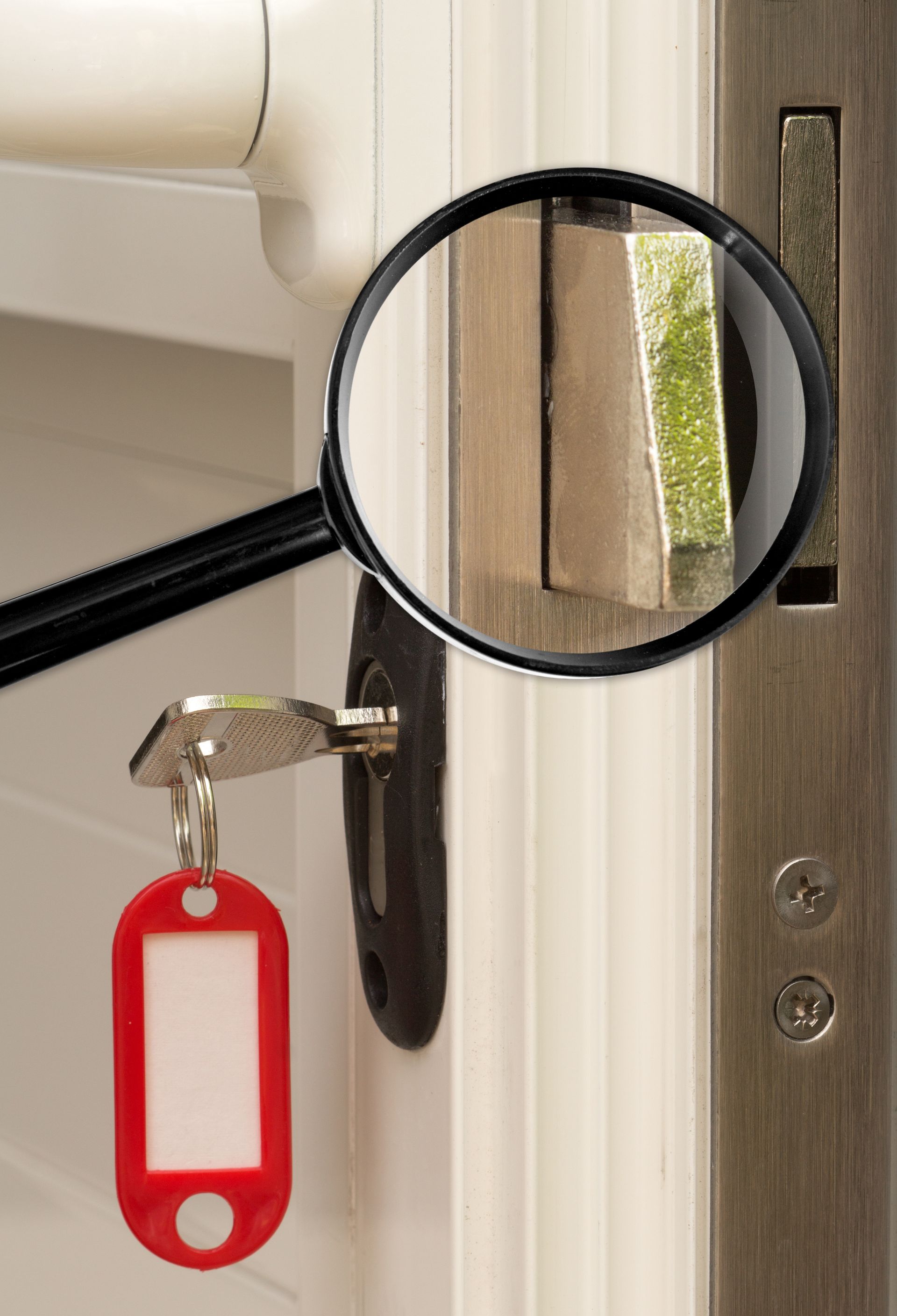 Une serrure et une loupe qui montre le barillet