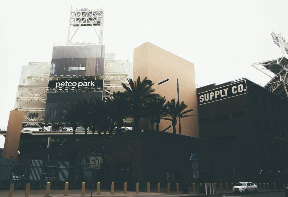 A large building with the word petco park on it