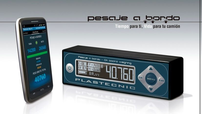 Un teléfono al lado de un dispositivo que dice 40760