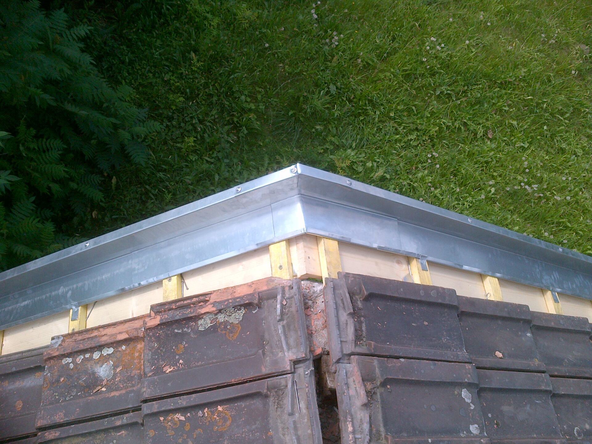 Pose d'une rive et main courante en zinc