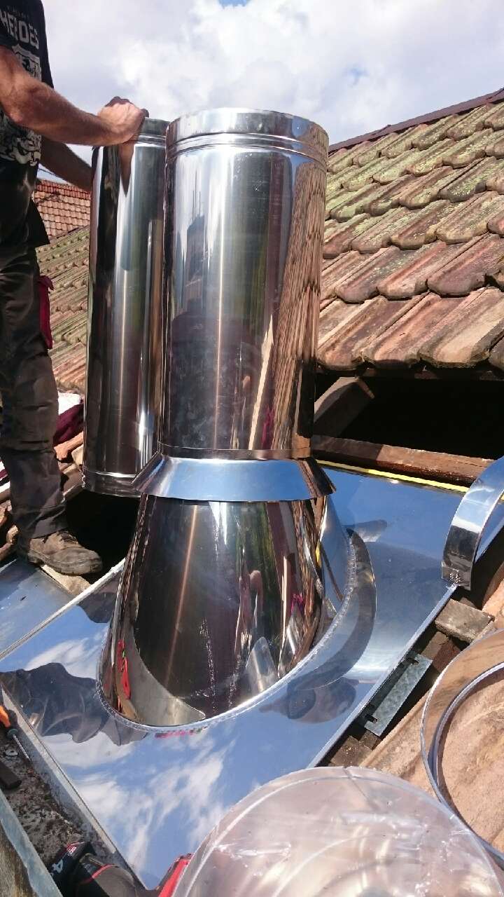 Pose de tubage de cheminée