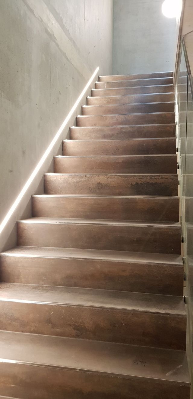 Escalier d'immeuble après travaux — réalisation par T&DI 