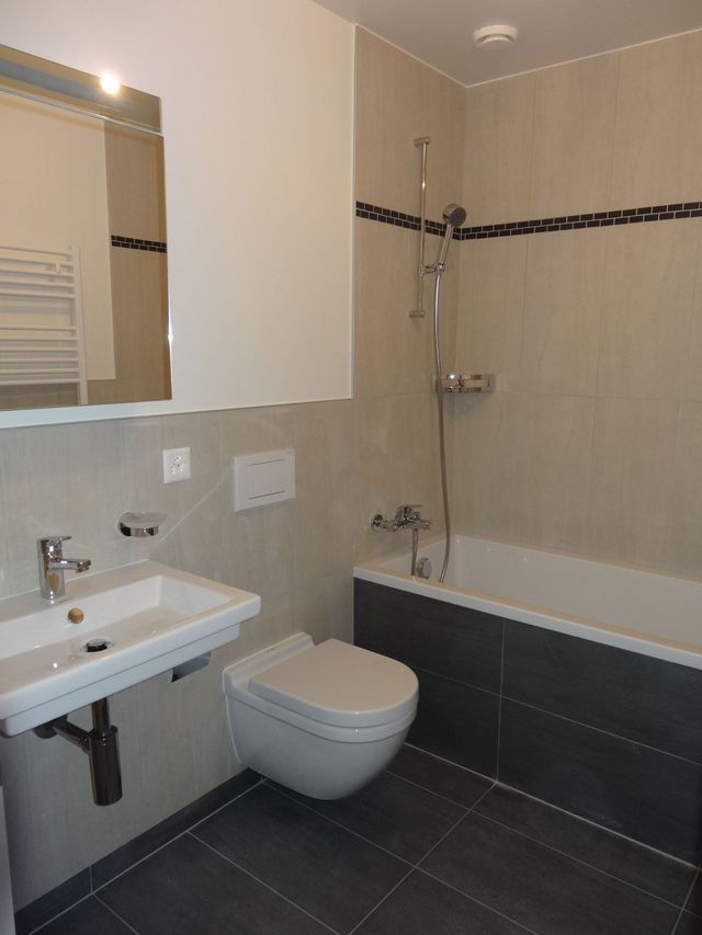 Rénovation-transformation intérieure d'une résidence - Salle de bains avec baignoire