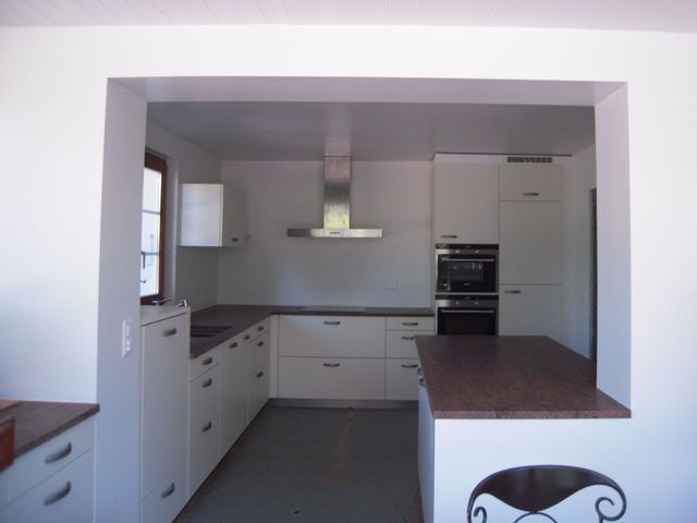 Cuisine d'une maison après rénovation-transformation 