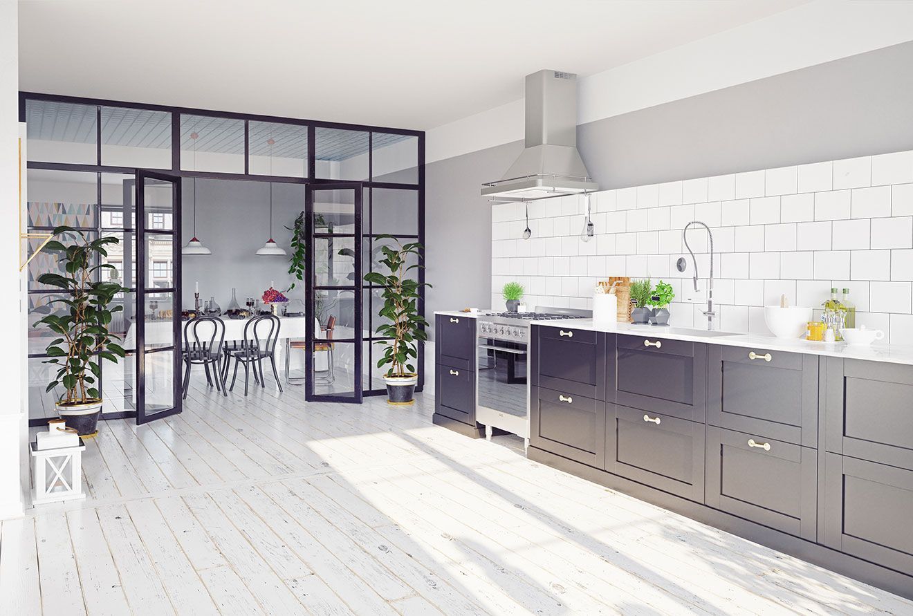 Porte verrière qui sépare la cuisine de la salle à manger