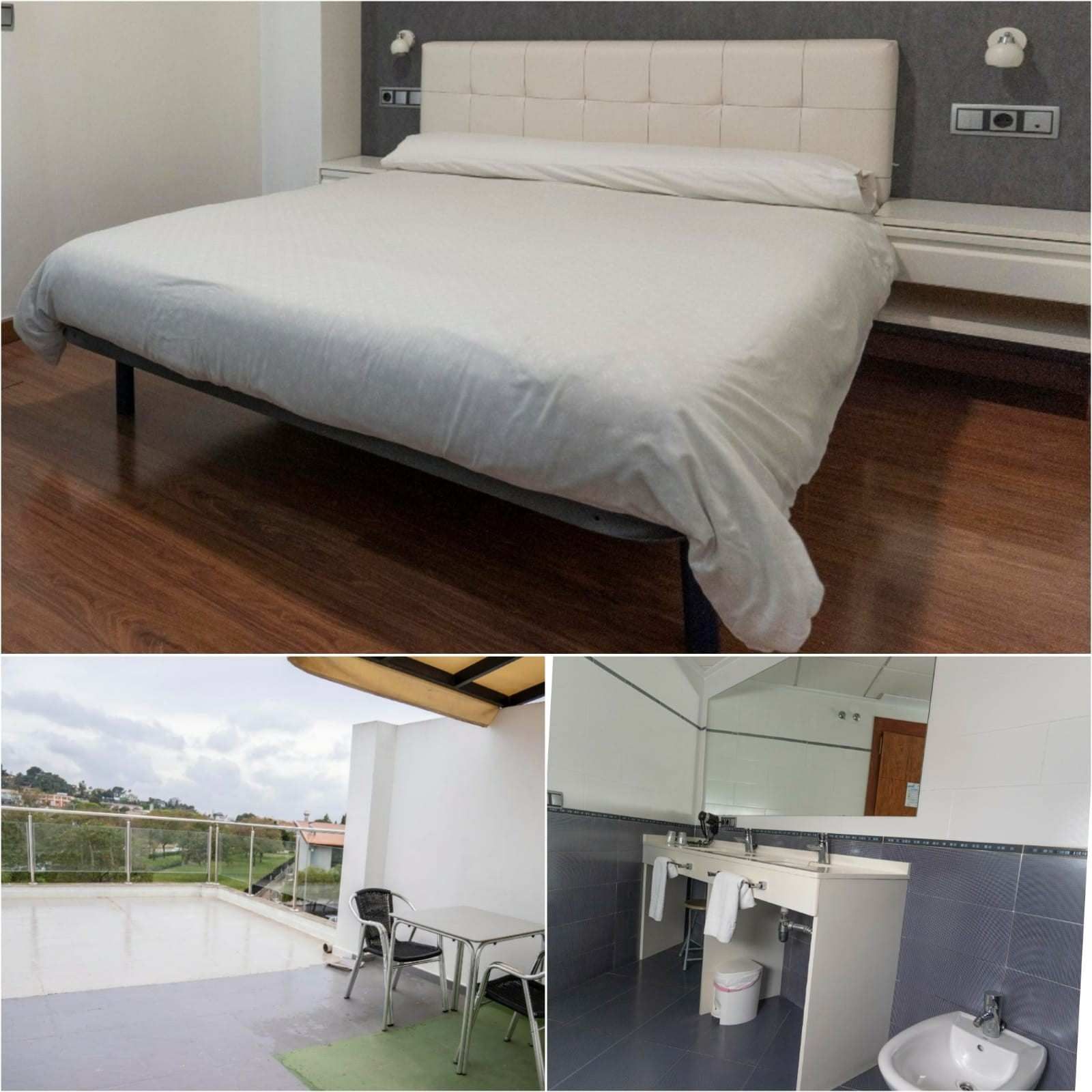 Dormitorio con cama, mesita de noche, terraza con mesa y sillas y un baño.