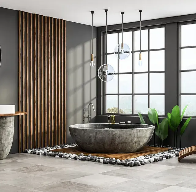 Un baño con bañera grande, lavabo y ventana.