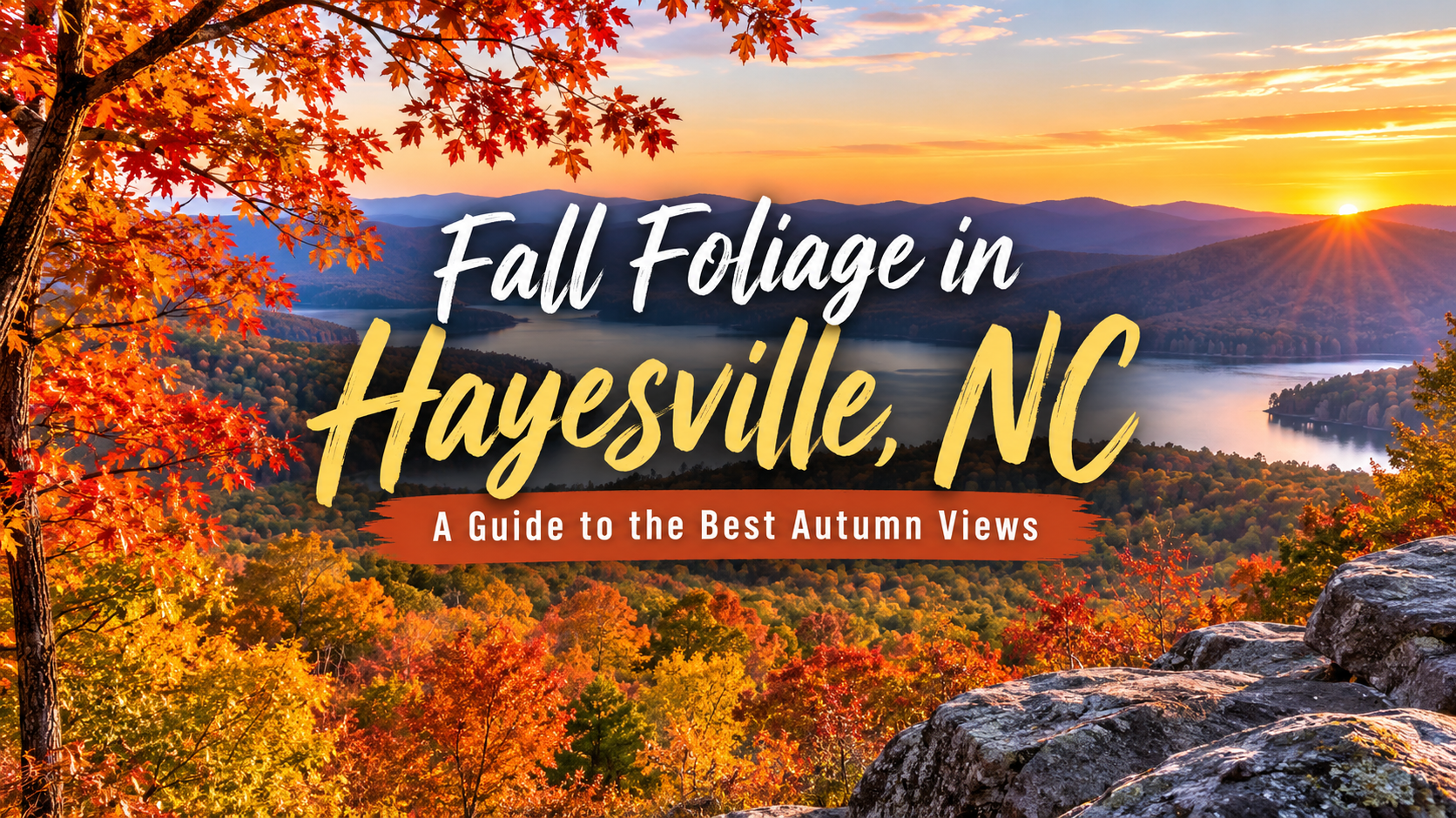 Fall foliage in Hayesville, NC with orange trees, mountains, and a sunrise over a lake