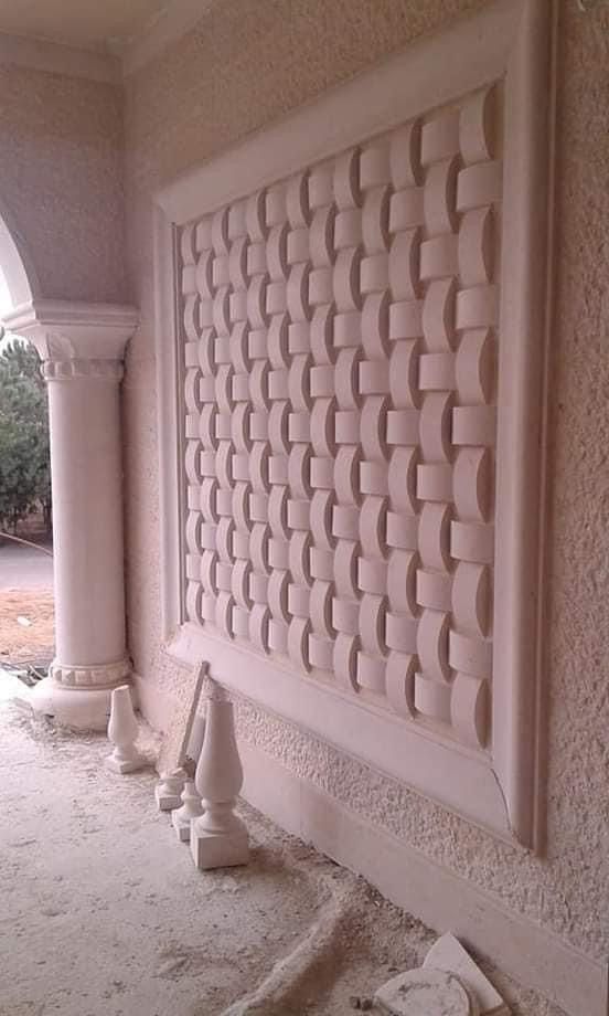 Taille d'un mur de pierre artistique