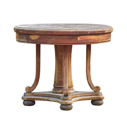 Trois livres anciens empilés, présentant des pages à bordure dorée vieillie et des couvertures en cuir décoratives.