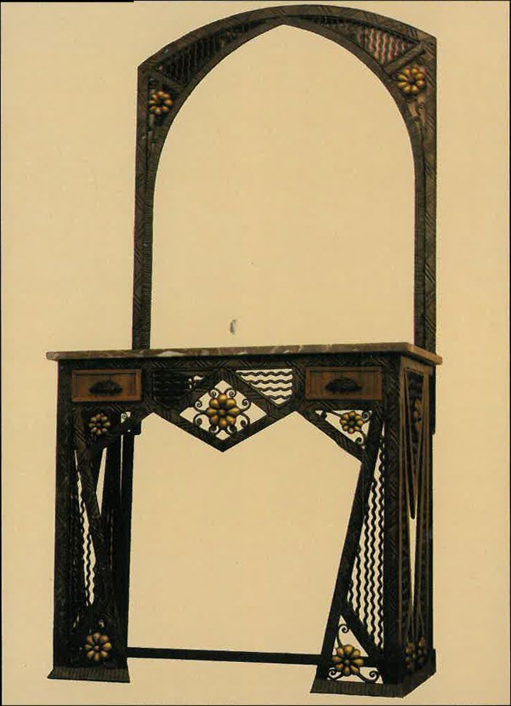 Coiffeuse ornée en métal sombre avec miroir arqué, détails dorés et deux tiroirs.