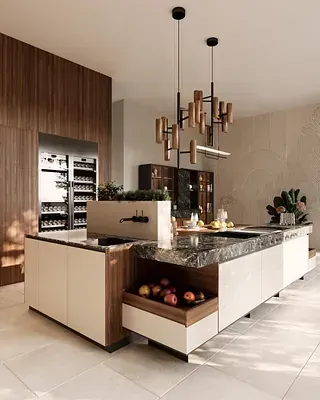 Una cocina con una gran isla y encimera de mármol.