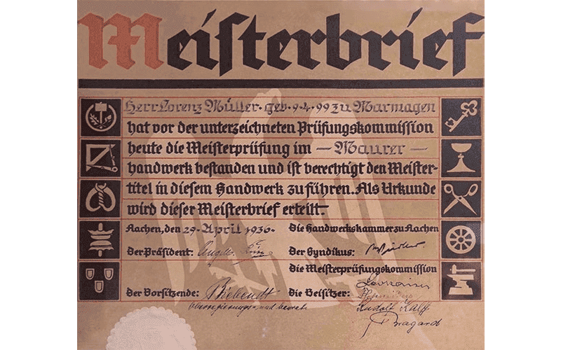 Ein Stück Papier mit der Aufschrift „Masterbrief“