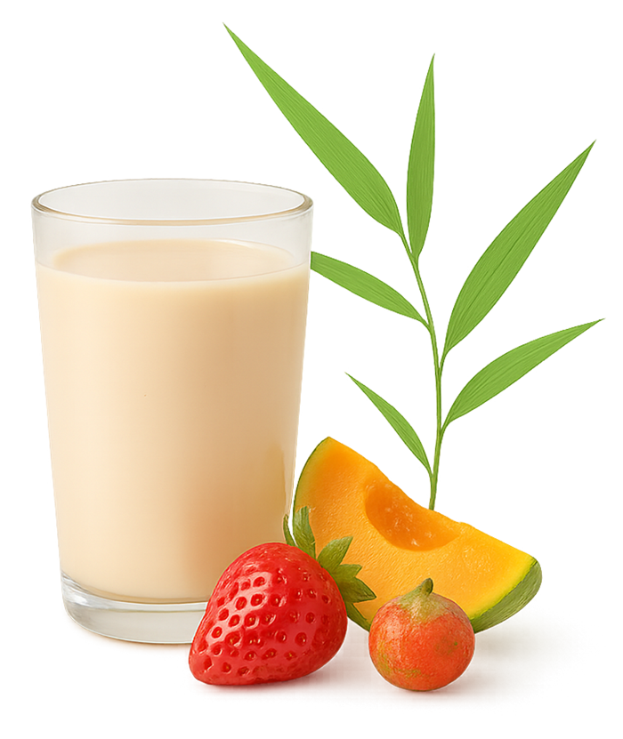 Ein Glas Milch neben einer Erdbeere und Melone