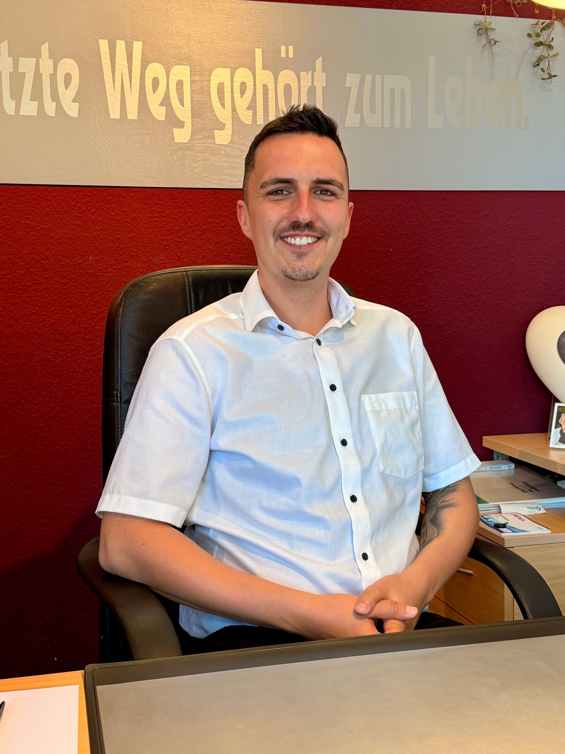 Bild von Max Hofmann am Arbeitsplatz