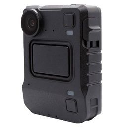 A black body camera is sitting on a white surface.