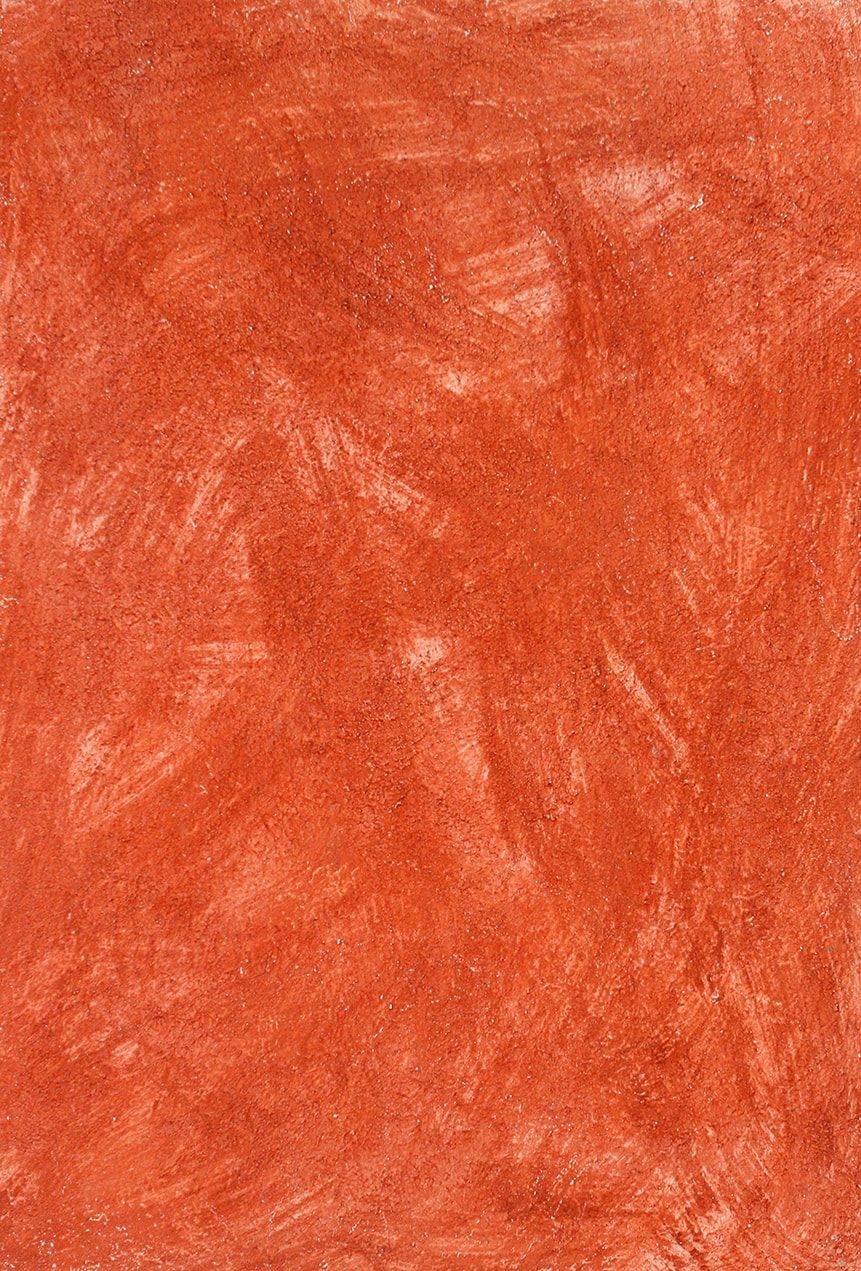 Eine Nahaufnahme einer roten Marmorstruktur.