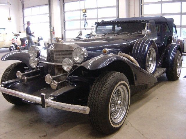Excalibur , Verdeckbezug Sonnenland Stoff blau angefertigt und montiert.