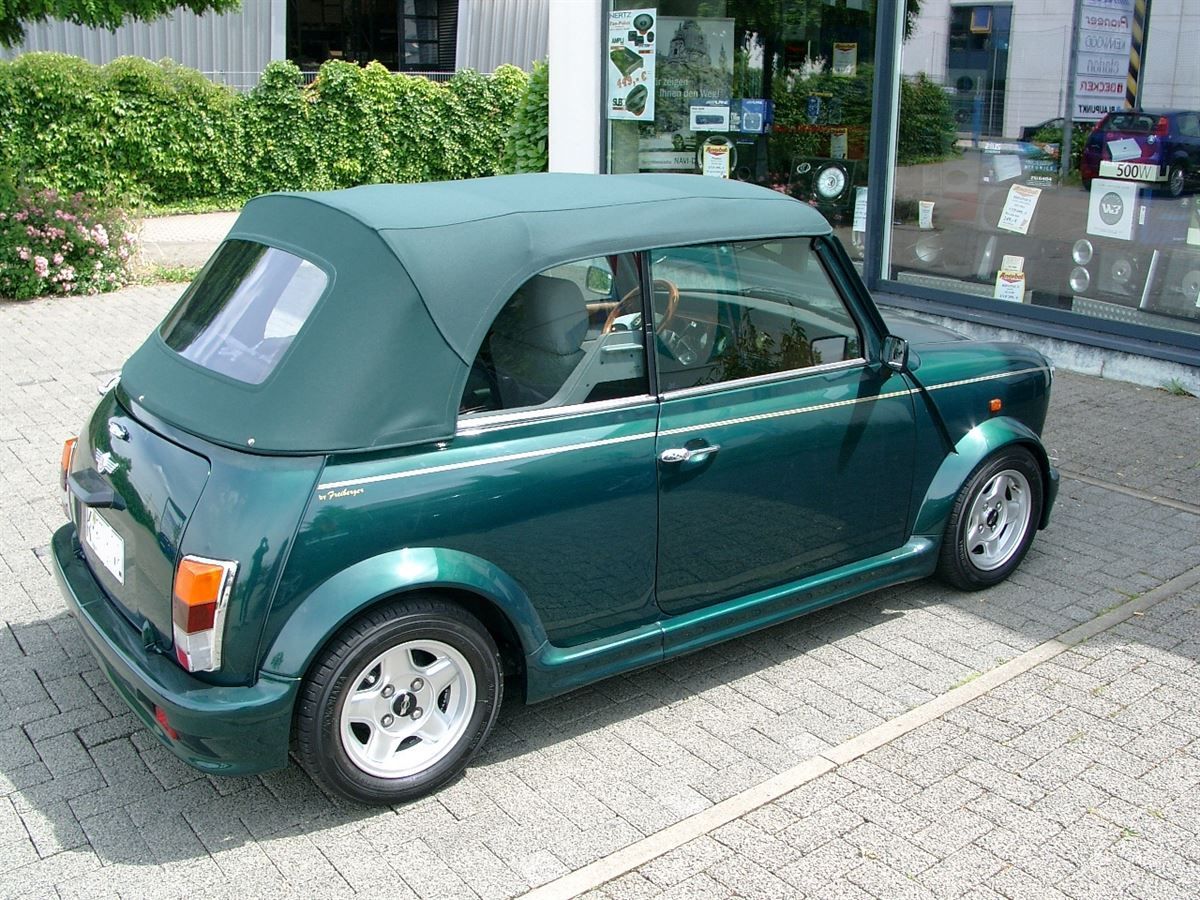Mini, Verdeckbezug in Sonnenland Stoff grün geliefert und montiert.