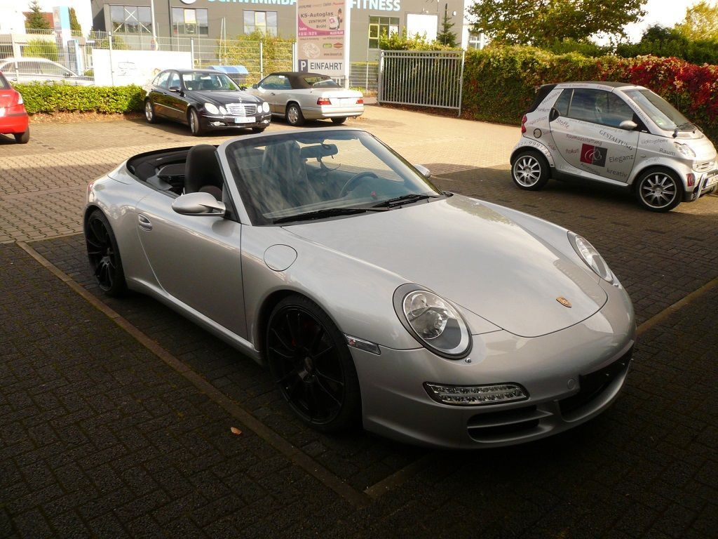 Porsche 911 (997), Verdeckbezug Sonnenland Stoff mit beheizter Glasheckscheibe, geliefert und montiert.