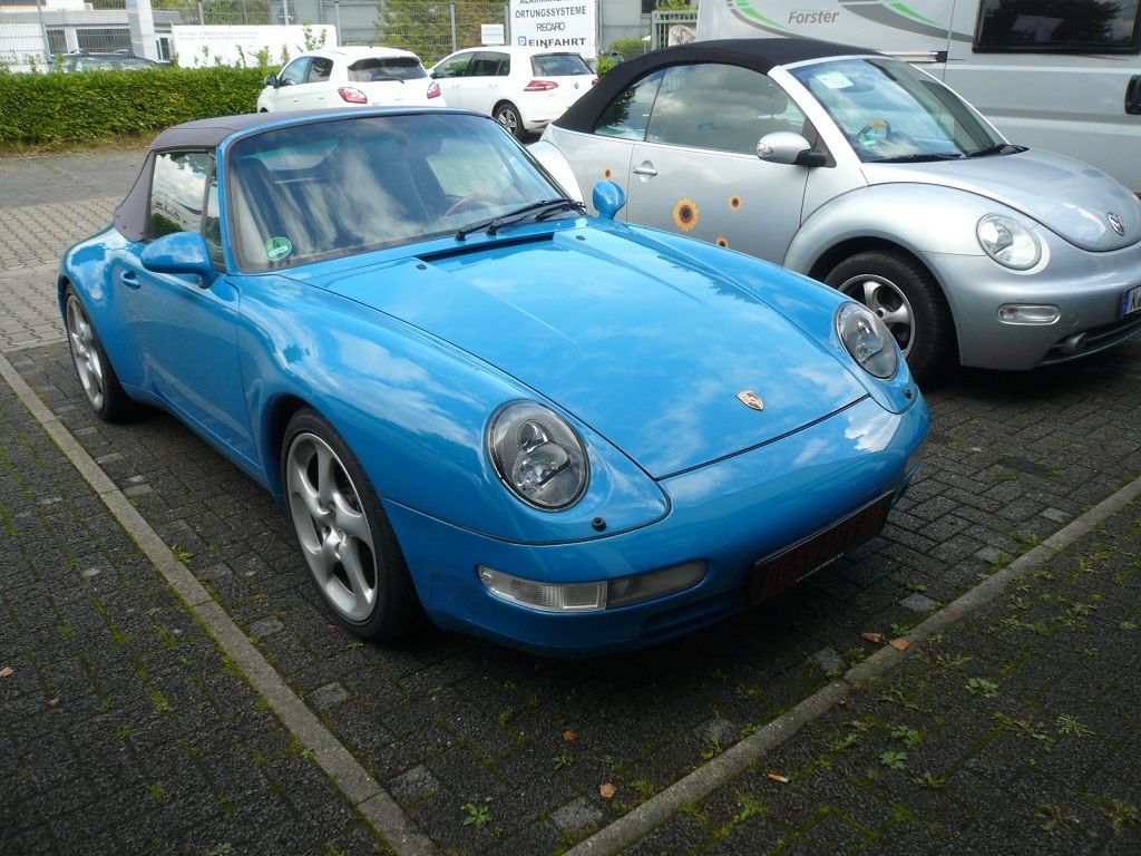 Verdeck Bezug in Sonnenland Stoff classicgrau für Porsche 911 Typ 993 Cabrio Bj. 94-98 geliefert und montiert.