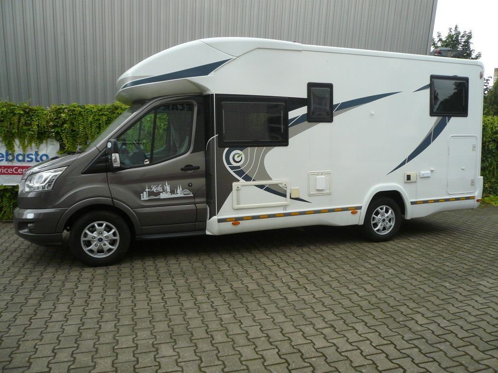 Alpine 9zoll Navigation INE-F904DC inkl. Multi-View Rückfahrkamera und Thitronik Alarmanlage in einem Ford Transit Wohnmobil nachgerüstet.