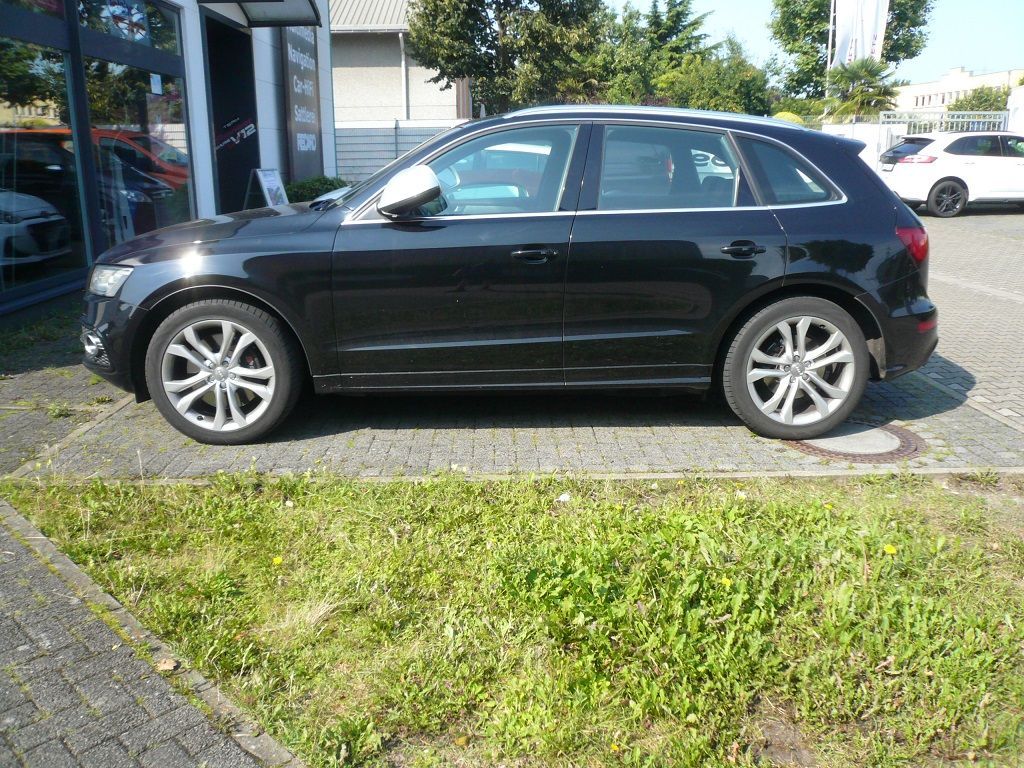 Alpine X703D-Q5 7-Zoll Premium-Infotainment-System inkl. Rückfahrkamera für Audi Q5 mit Navigationssystem, Apple CarPlay und Android Auto Unterstützung nachgerüstet.