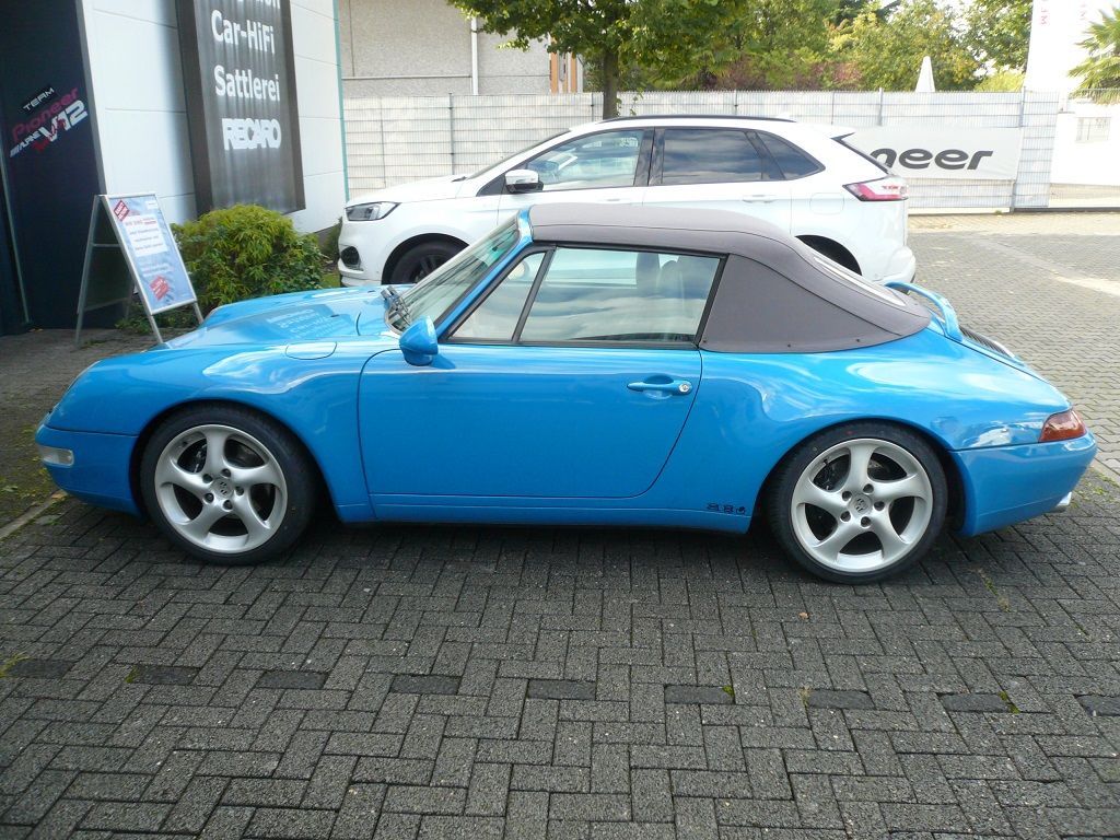 Verdeck Bezug in Sonnenland Stoff classicgrau für Porsche 911 Typ 993 Cabrio Bj. 94-98 geliefert und montiert.