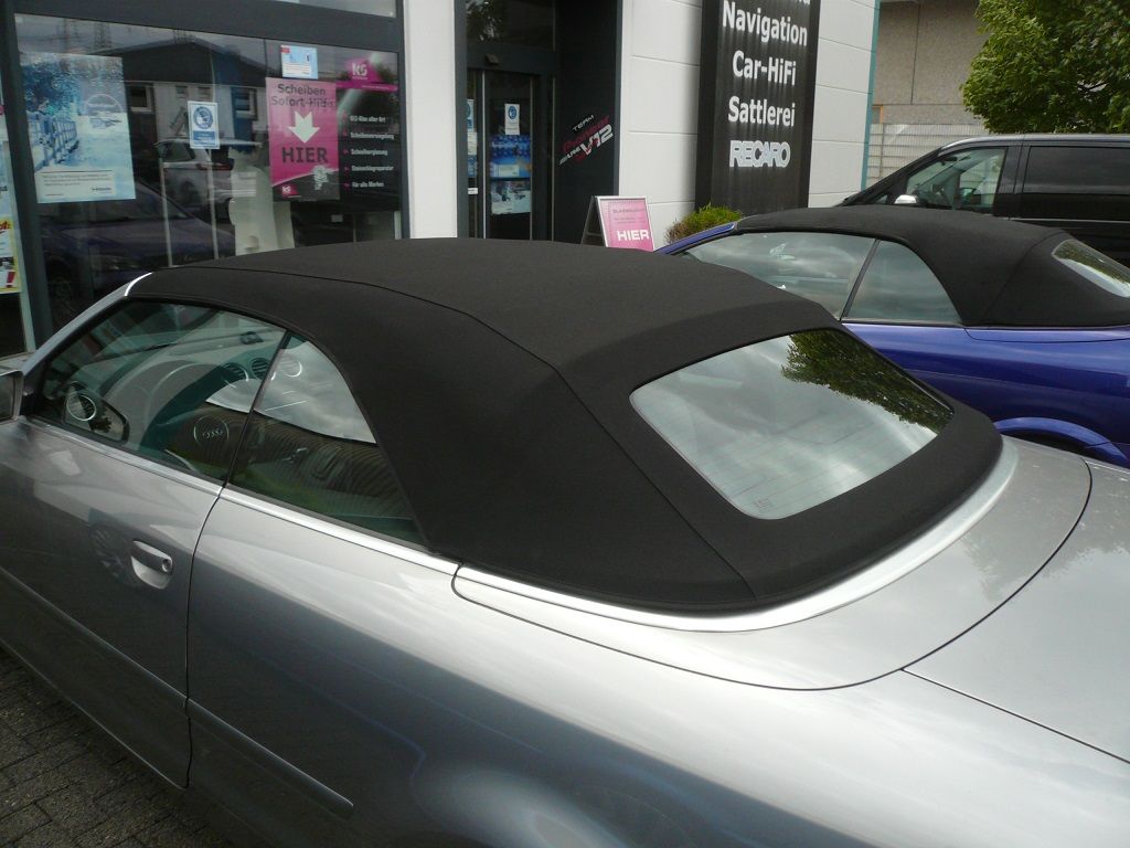 Audi A4, Verdeckbezug Sonnenland Stoff schwarz geliefert und montiert.
