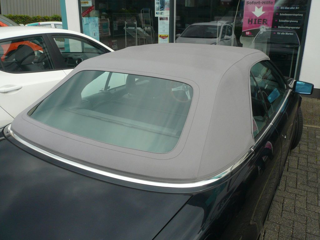 Verdeckbezug in Sonnenland Stoff grau geliefert und montiert.