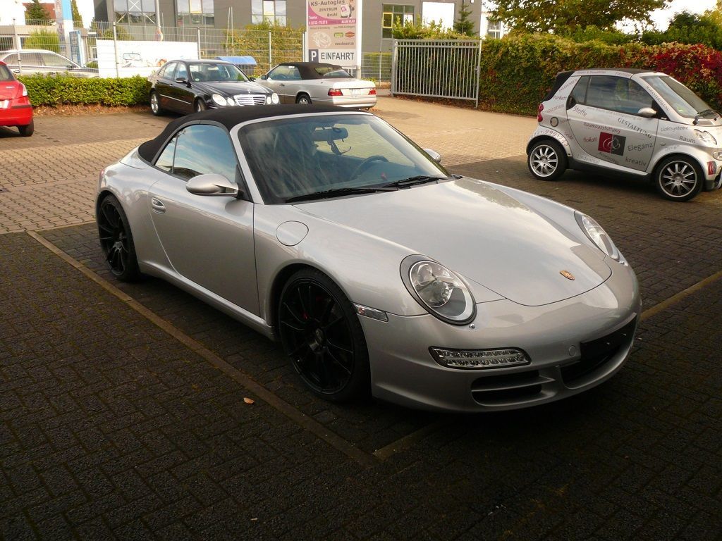Porsche 911 (997), Verdeckbezug Sonnenland Stoff mit beheizter Glasheckscheibe, geliefert und montiert.