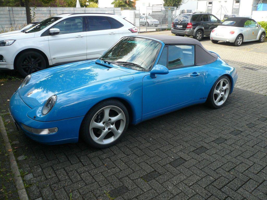 Verdeck Bezug in Sonnenland Stoff classicgrau für Porsche 911 Typ 993 Cabrio Bj. 94-98 geliefert und montiert.