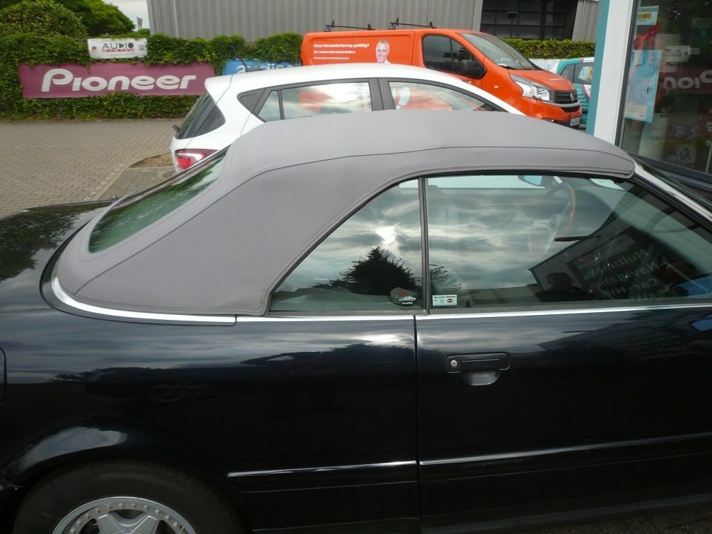 Verdeckbezug in Sonnenland Stoff grau geliefert und montiert.