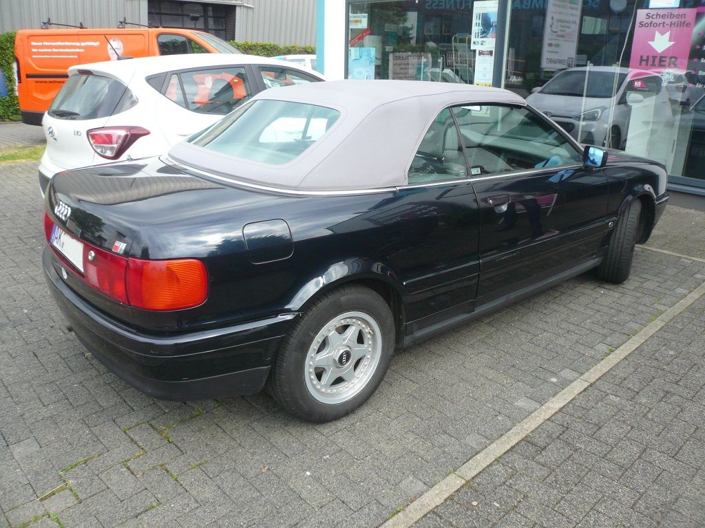 Verdeckbezug in Sonnenland Stoff grau geliefert und montiert.