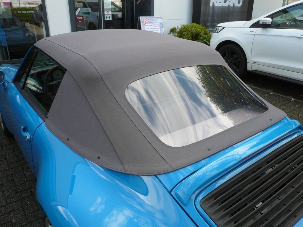 Verdeck Bezug in Sonnenland Stoff classicgrau für Porsche 911 Typ 993 Cabrio Bj. 94-98 geliefert und montiert.